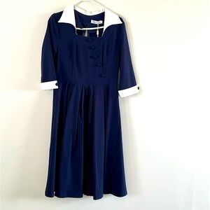 Vintage inspired navy blue dress.